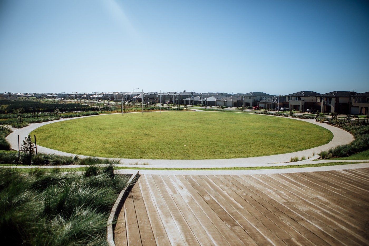 Turf maintenance with a ride-on mower on a managed lawn